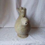 Old grey terracotta jug