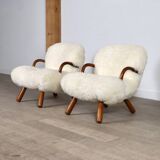 Early pair of arnold madsen clam chairs in curly sheepskin, madsen & schubell, 1944