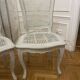 Set of 4 white caned chairs in Louis XV style.