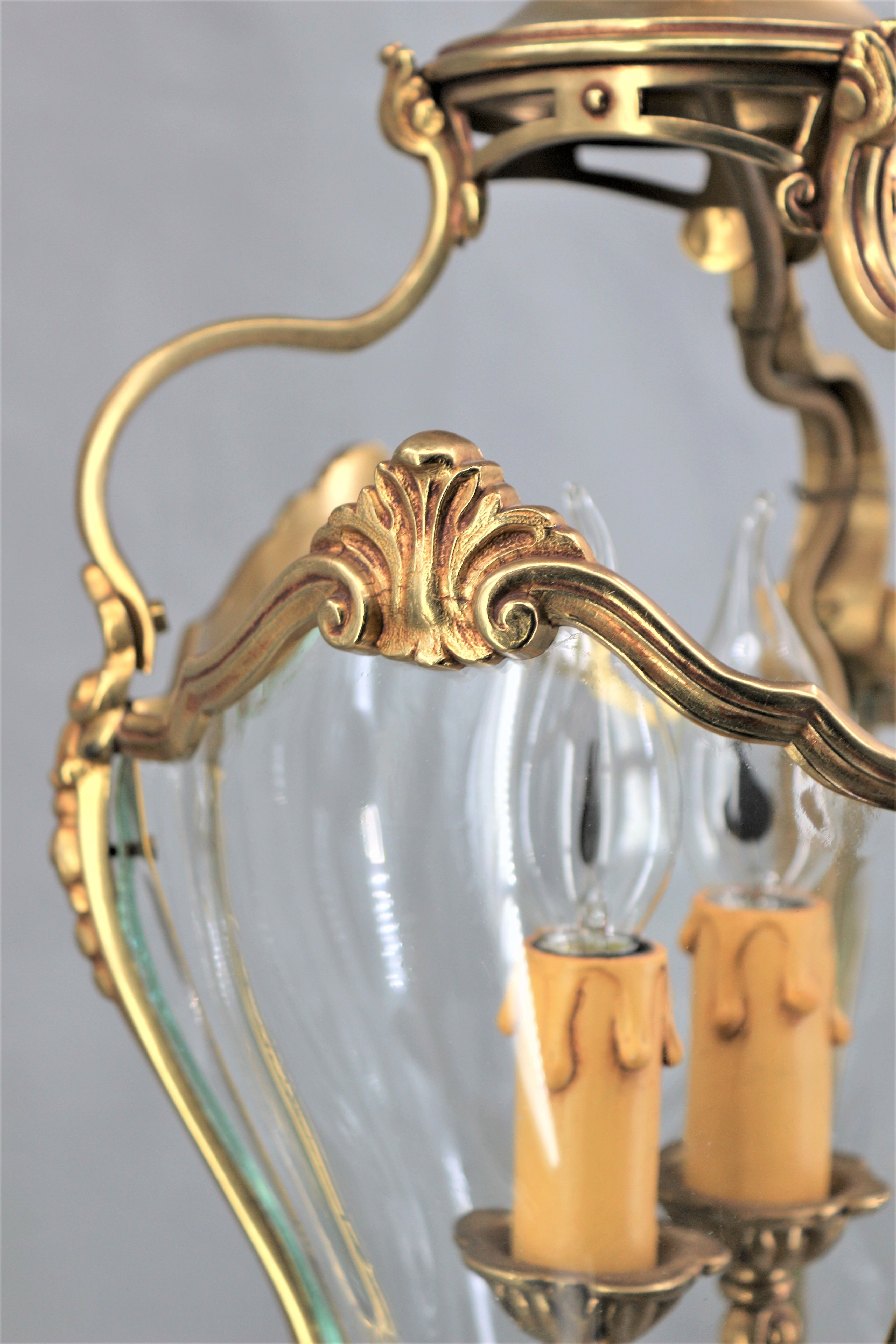 Lustre en bronze et verre bombé