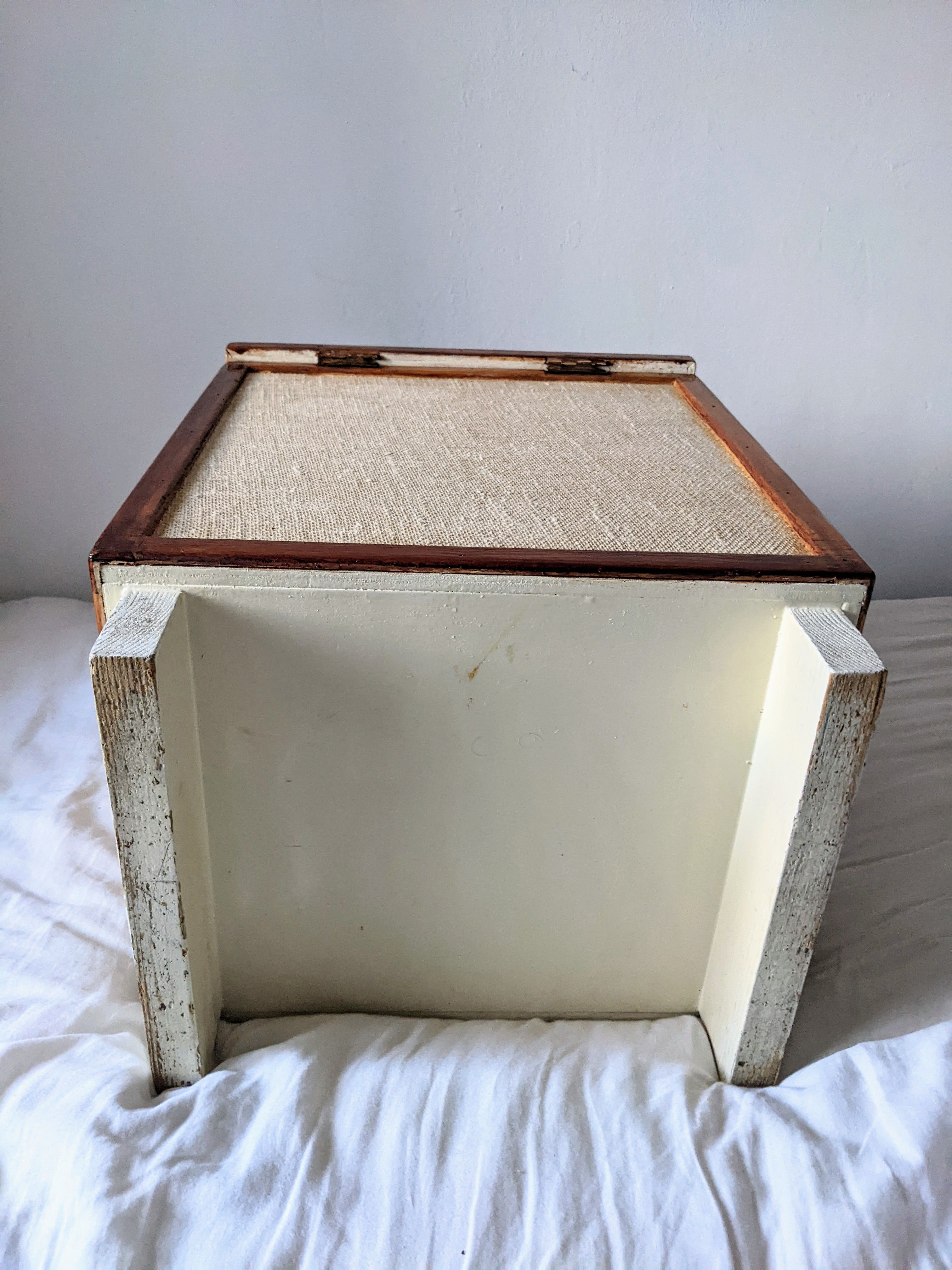 Burlap chest and varnished wood