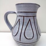 Vintage pitcher in enamelled earth
