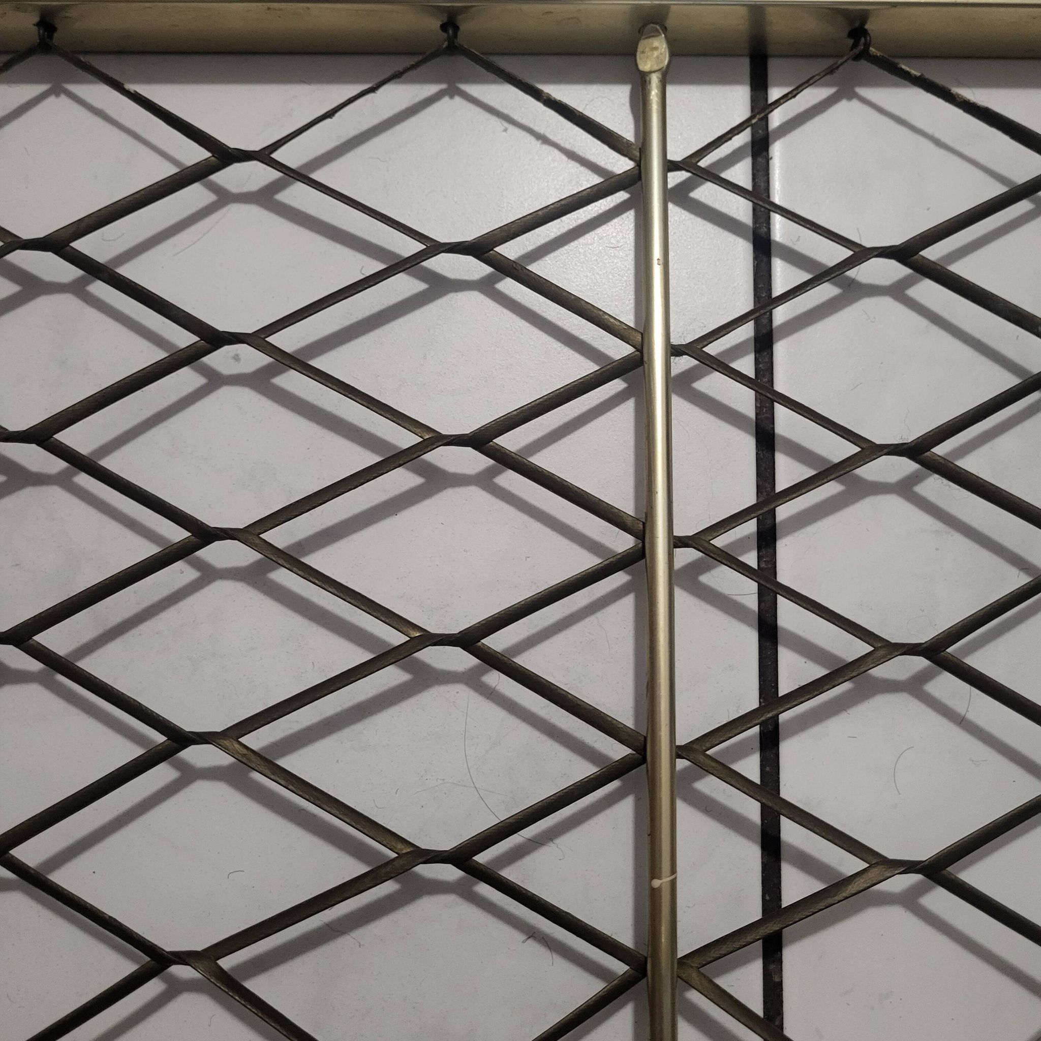 Coat rack in gold aluminum from the 50s and 60s