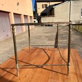 Brass side table with smoked glass.