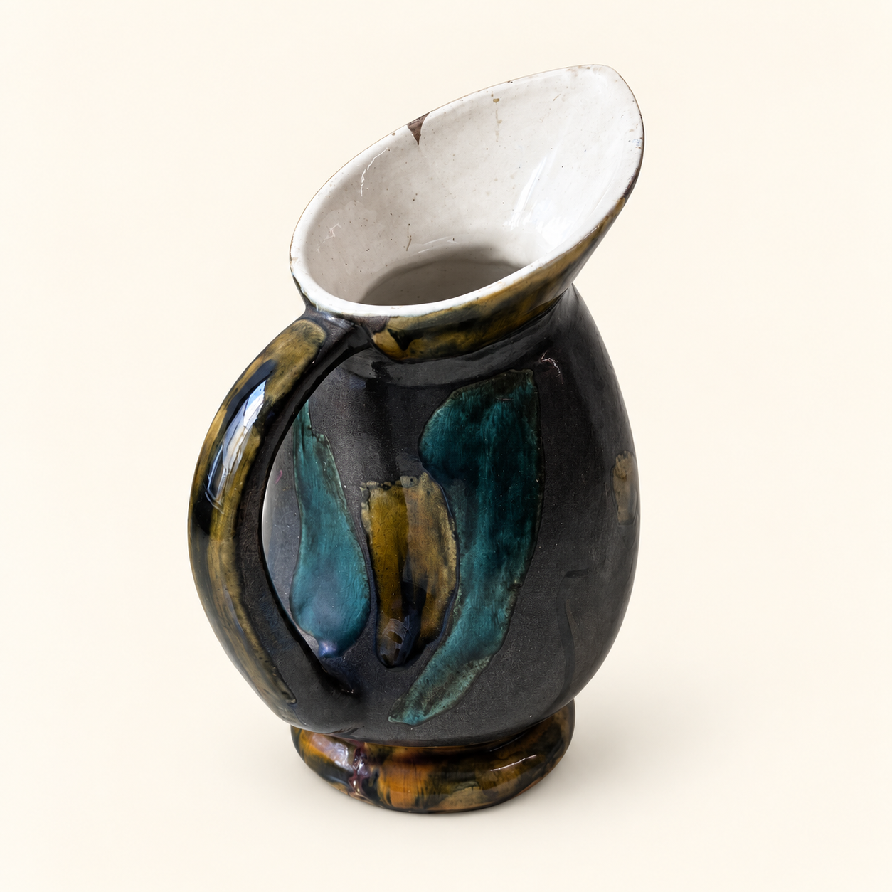 Glazed ceramic pitcher from the 1960s.