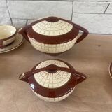 Small tea service in fine earthenware.