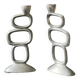 Pair of aluminum candlesticks