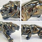 Art Deco lion statue 1930 cracked Saint Clément