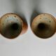 2 mazagrans forme diabolo en grès signé Nigon
