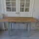 Vintage farm table, base and belt re-enchanted in verdigris, wooden top.