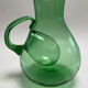 Large green glass cooling jug