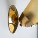 Set of three brass sconces with decorated yellow glass shades