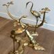 Coffee table model with cranes surrounding a brass bonsai and round glass top by Willy Daro.