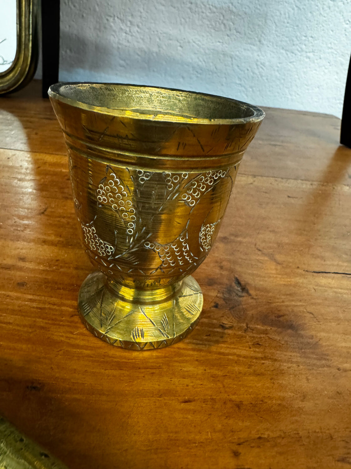 Golden brass mortar and pestle