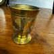 Golden brass mortar and pestle