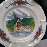 12 plates of the Obernai earthenware décor service signed Henri Loux