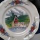 12 plates of the Obernai earthenware décor service signed Henri Loux