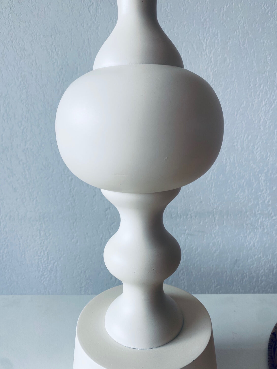 Large turned white wooden lamp