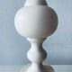 Large turned white wooden lamp
