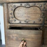 Very old elm wood with carved patterns and ironwork pieces.