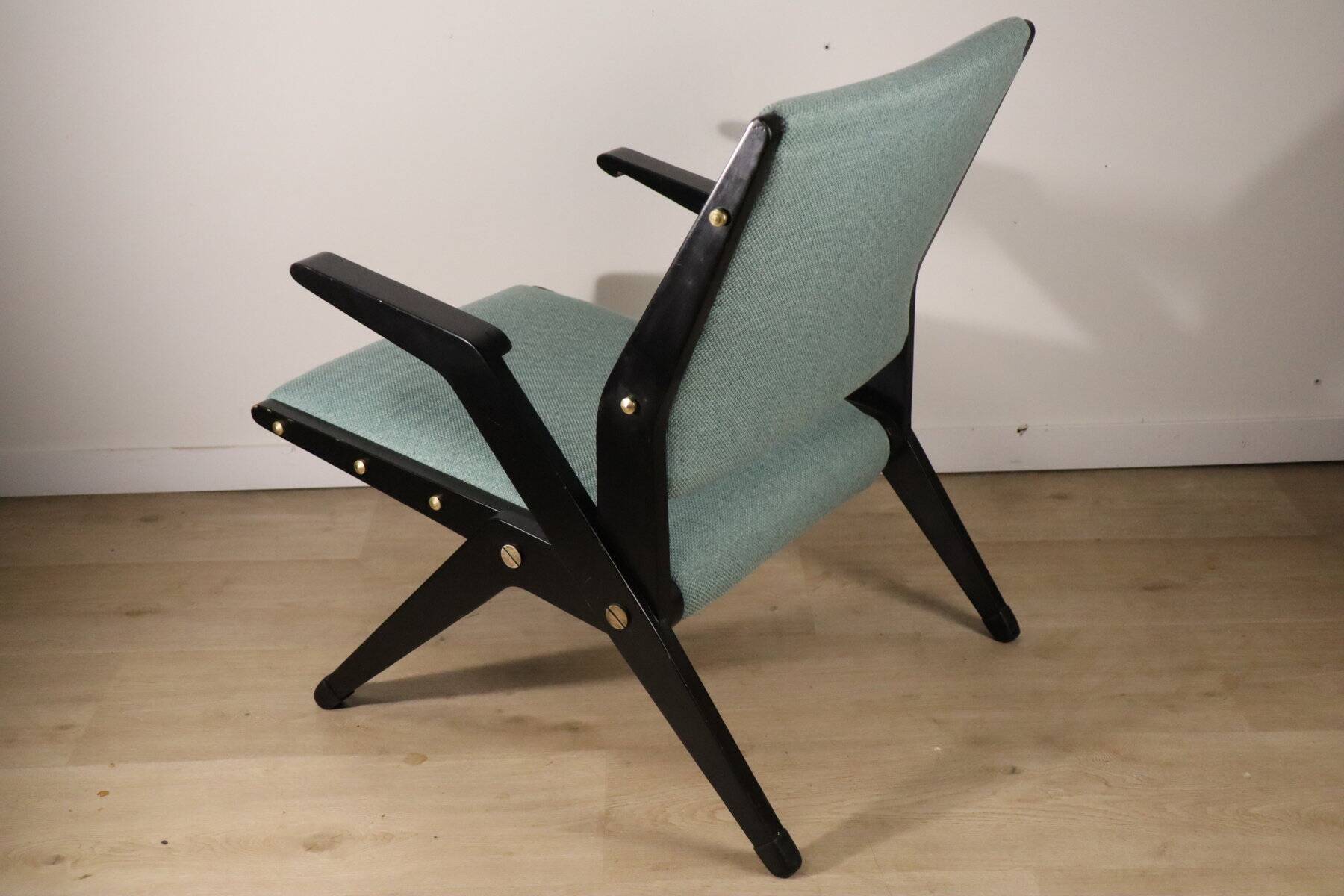Vintage armchair from the 1960s in black wood and fabric.