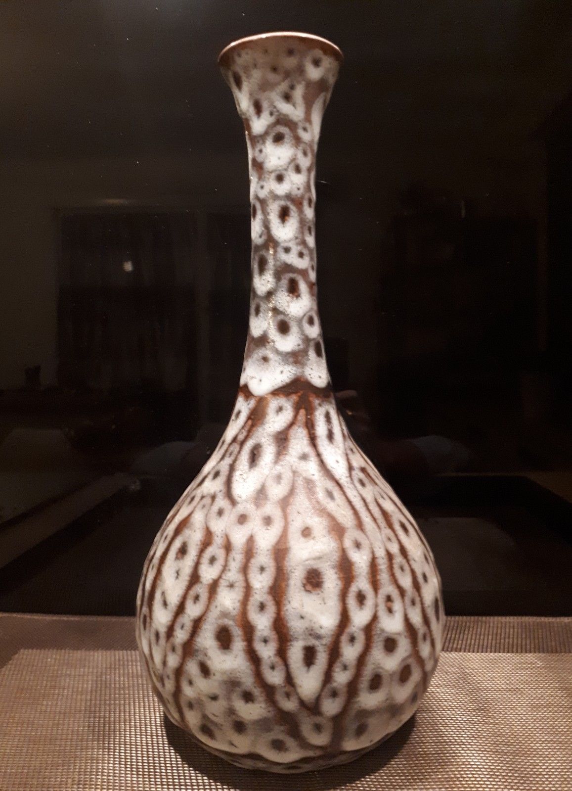 Long-necked vase from the 20s and 40s enamelled sandstone artist Tf's signature