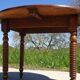 Antique walnut console table with honey spoon legs.