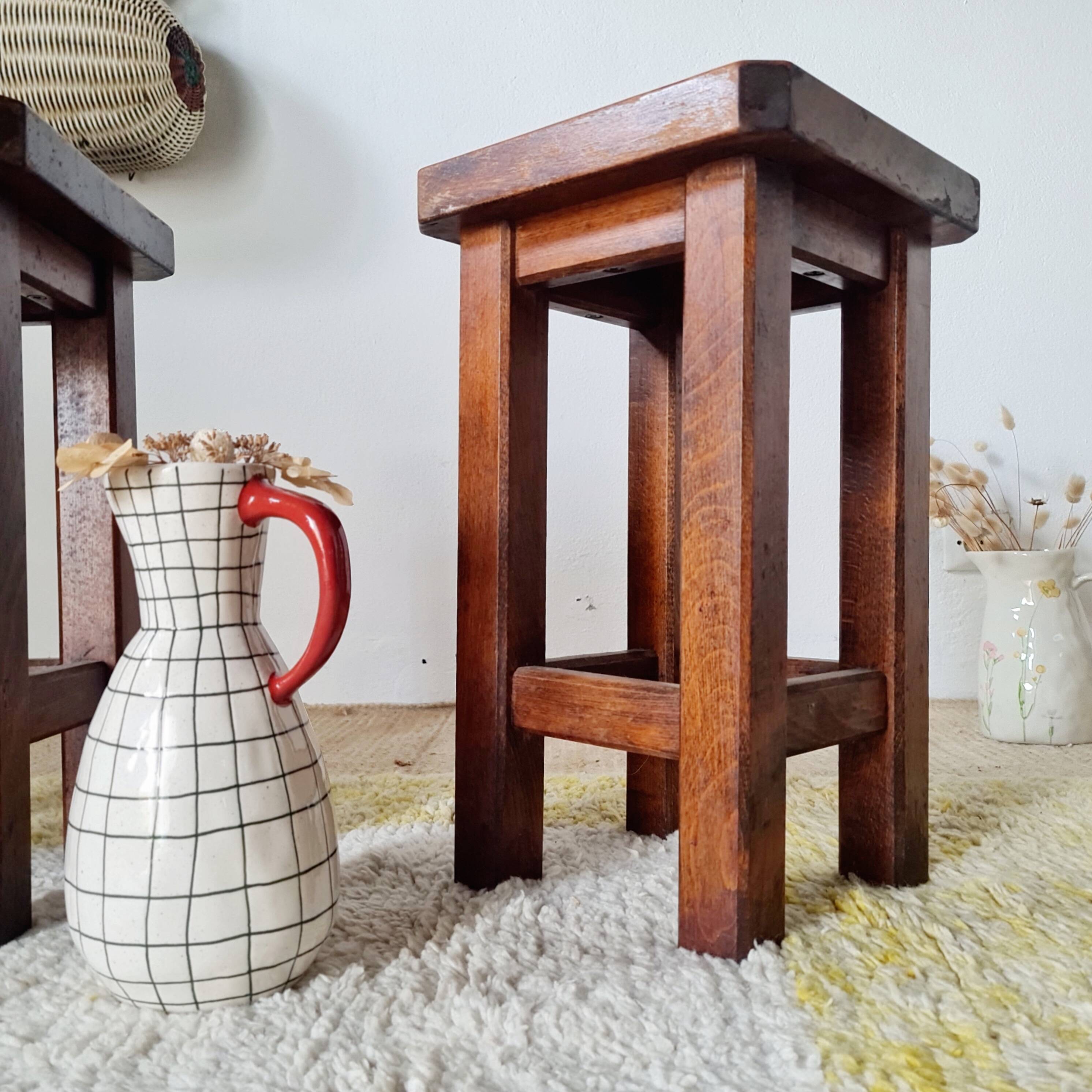 Pair of brutalist wooden stools, bedside tables.