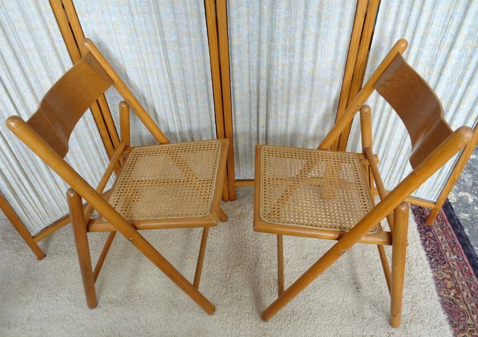 Pair of canned folding chairs