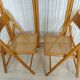 Pair of canned folding chairs
