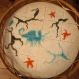 Rattan and ceramic coffee table signed chassin