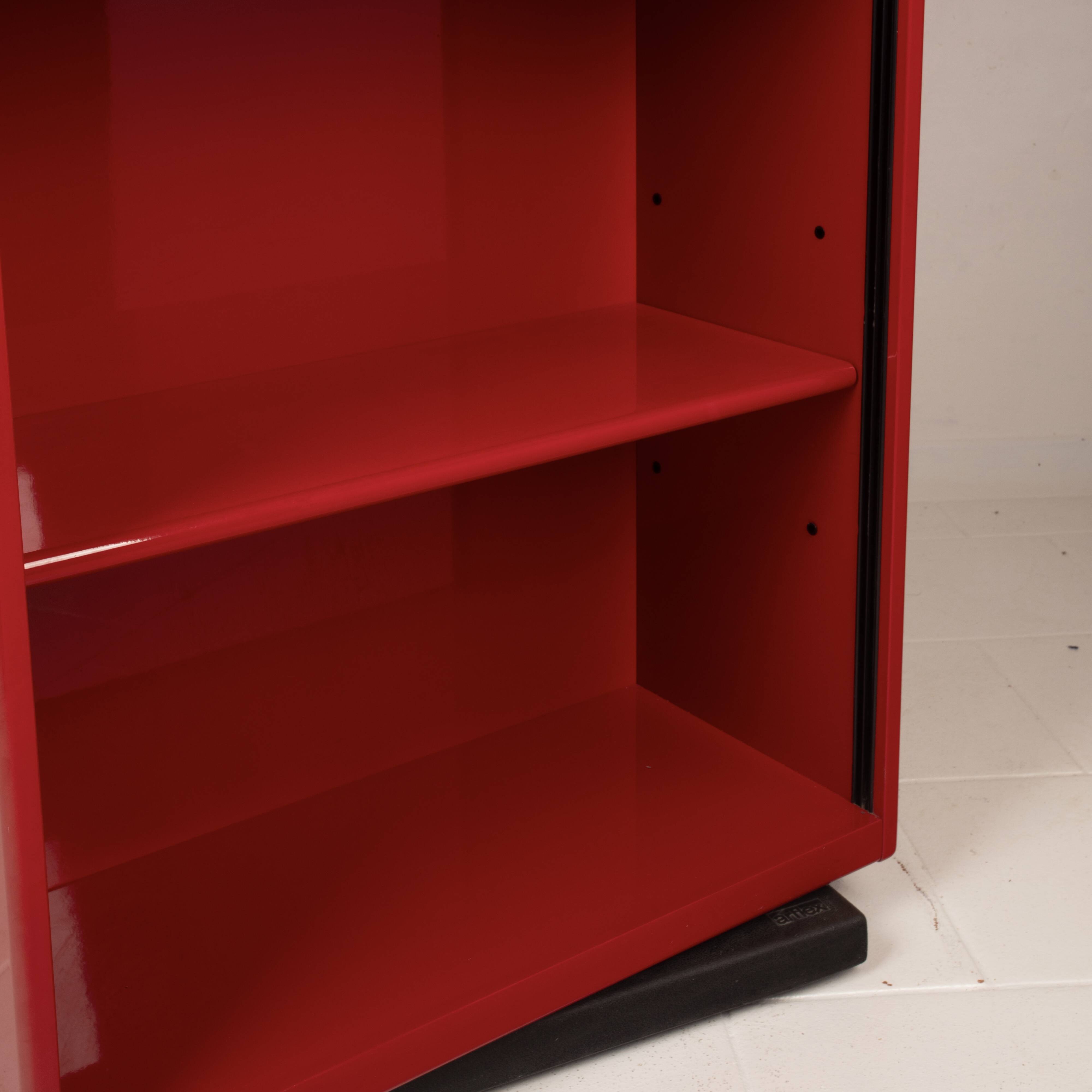 Double-face rotating display cabinet in red lacquer by Arflex, 1980s