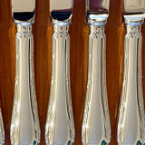 Christofle crossed ribbons, cutlery set for 6 people in new condition, 24 pieces.