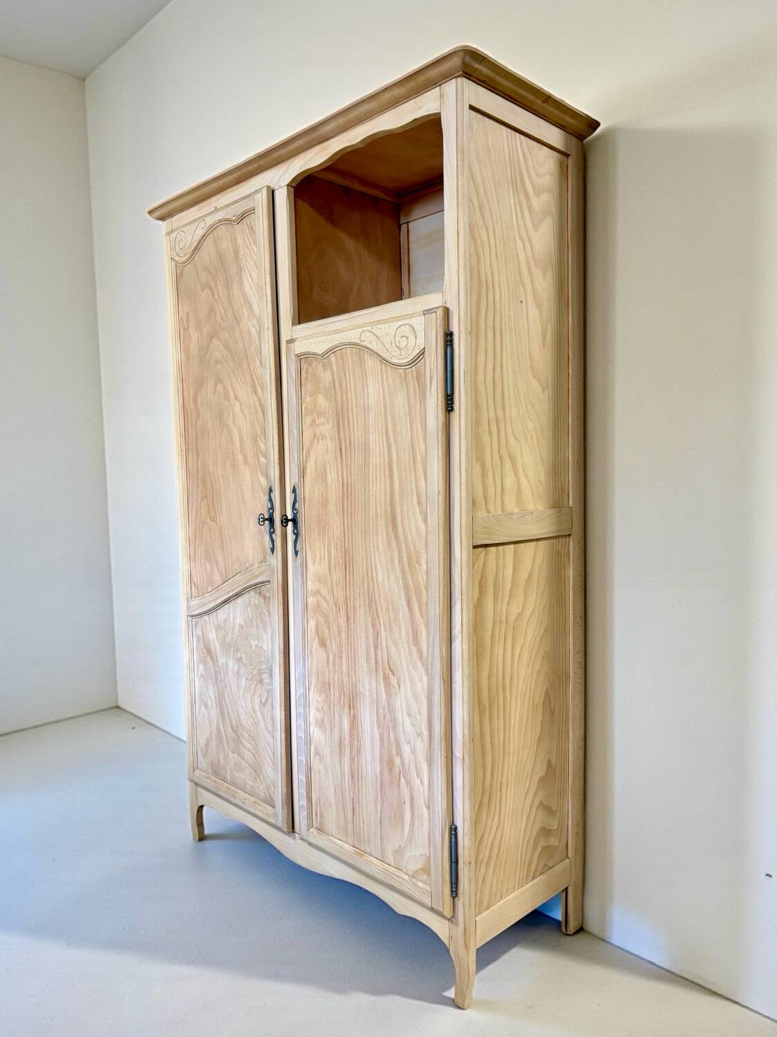 Renovated antique wardrobe – natural wood & sage green interior