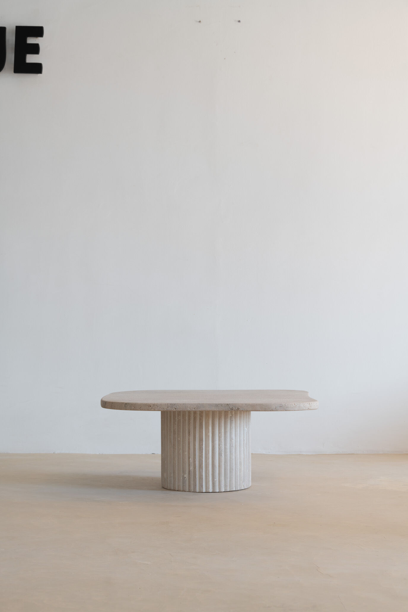 Athena irregular coffee table in natural travertine