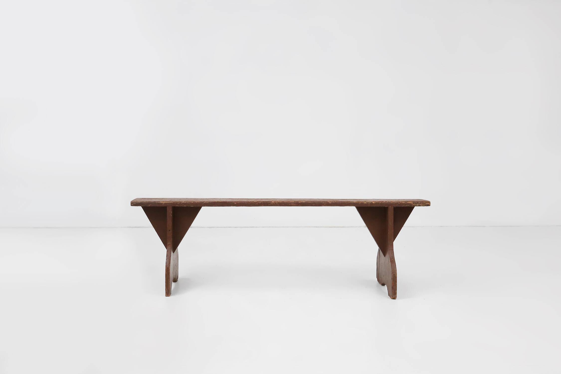 Mid-century rustic bench in brown painted wood, France ca. 1890