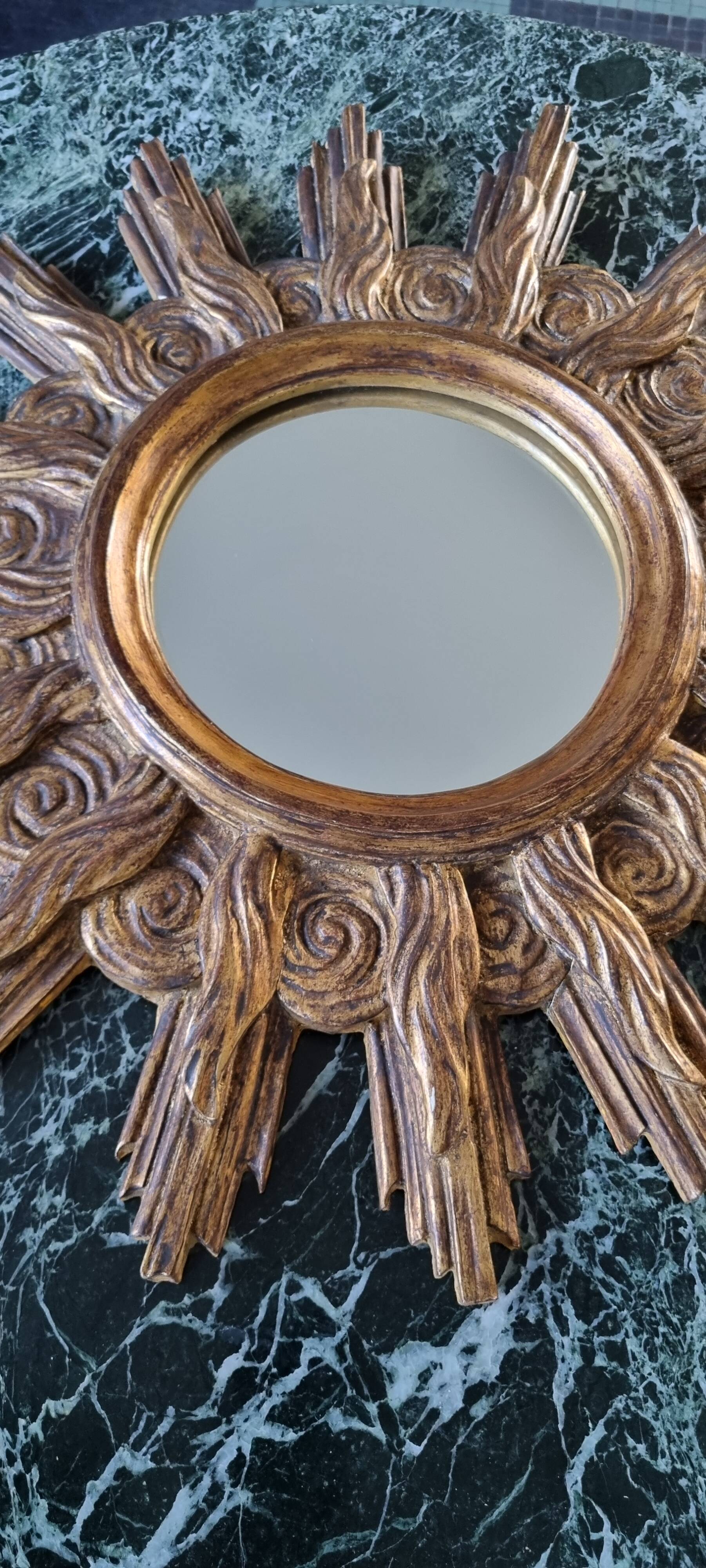 Vintage wooden and gold sun mirror