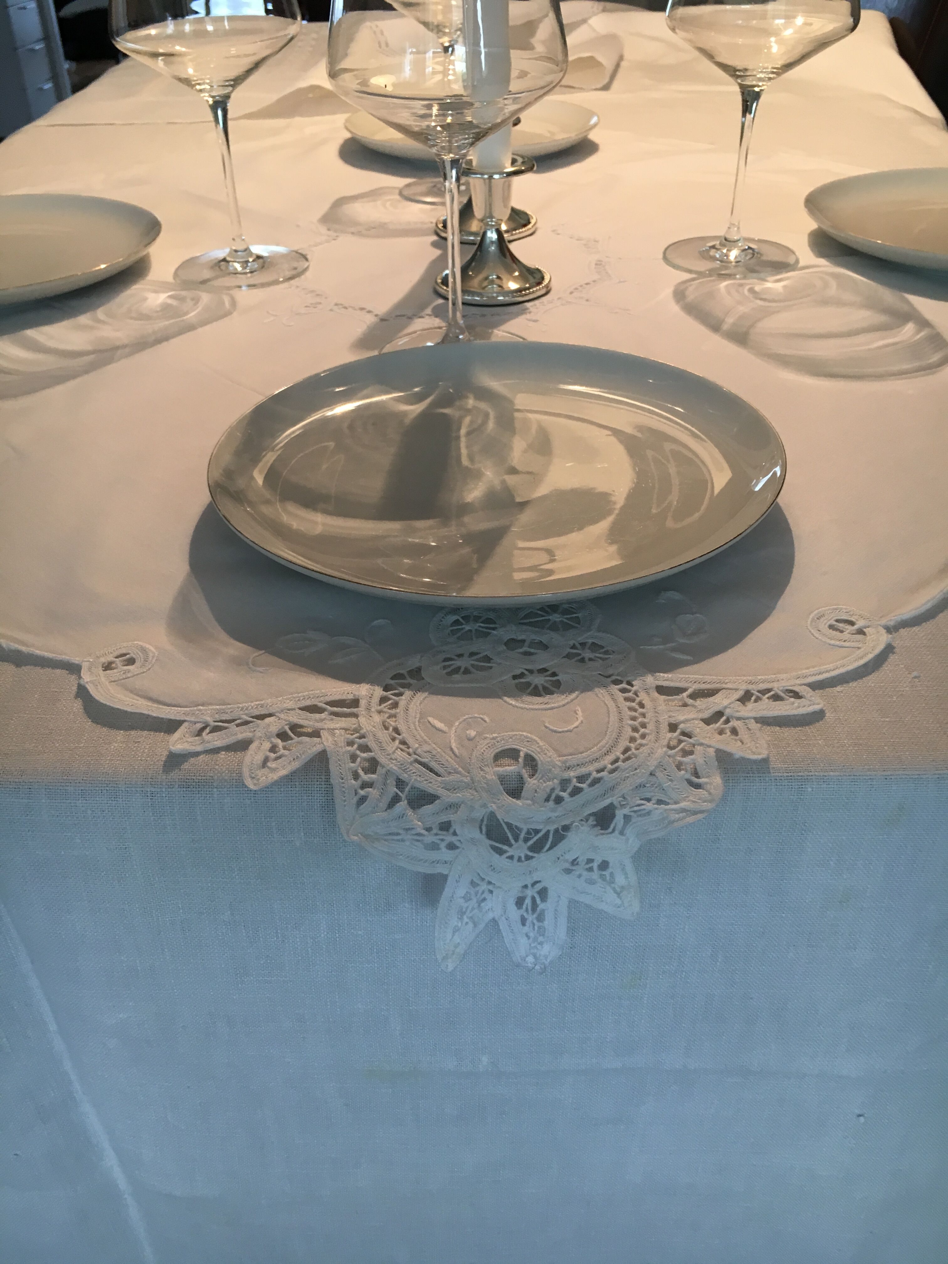 Old embroidered white cotton tablecloth