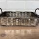 Woven silver-plated metal basket.
