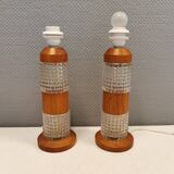 Swedish table lamps made of teak wood and hard pressed crystal glass.