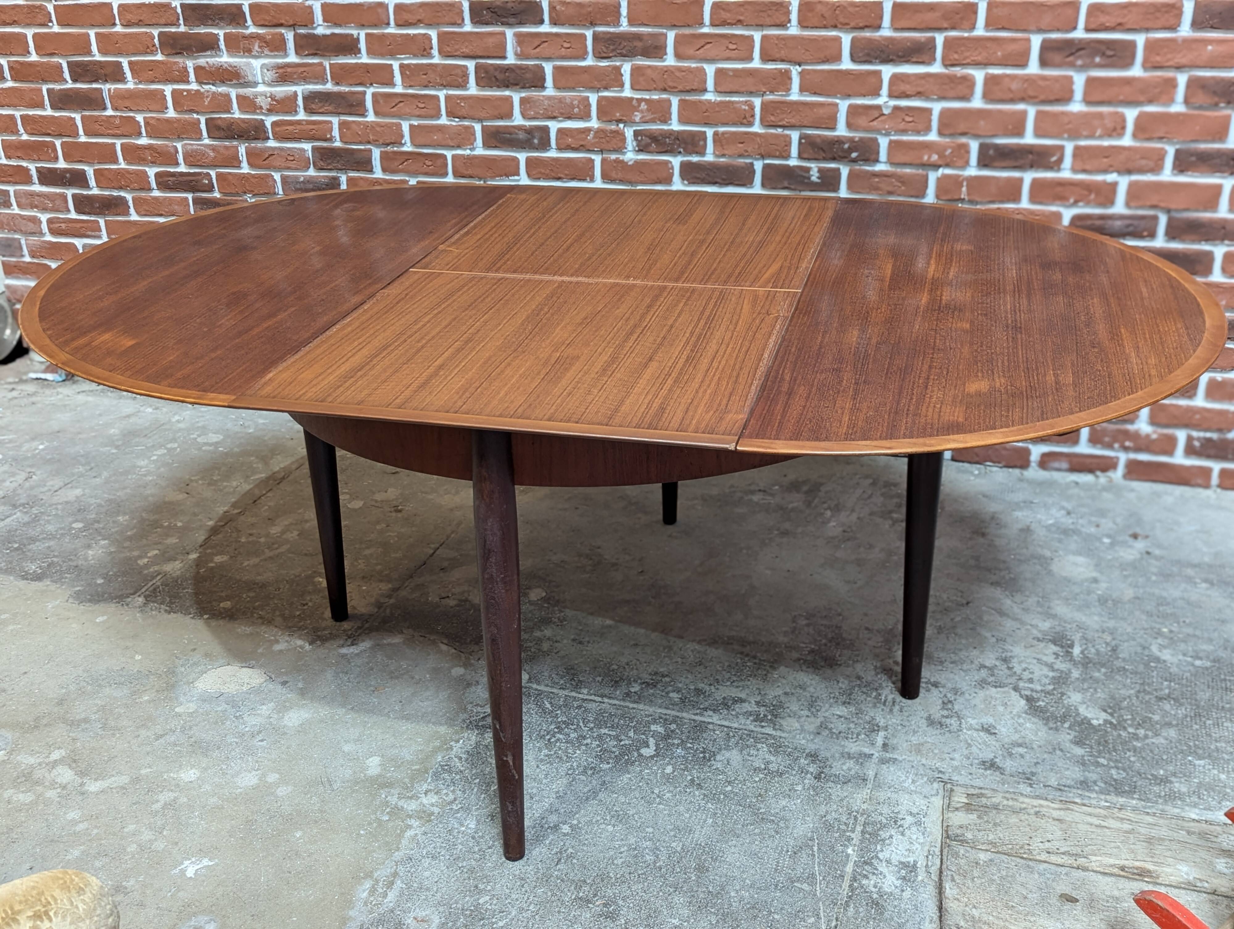 Round teak table from the 60s