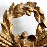 Miroir en bois doré, style Louis XVI – 1ère partie XXe - 60x30cm