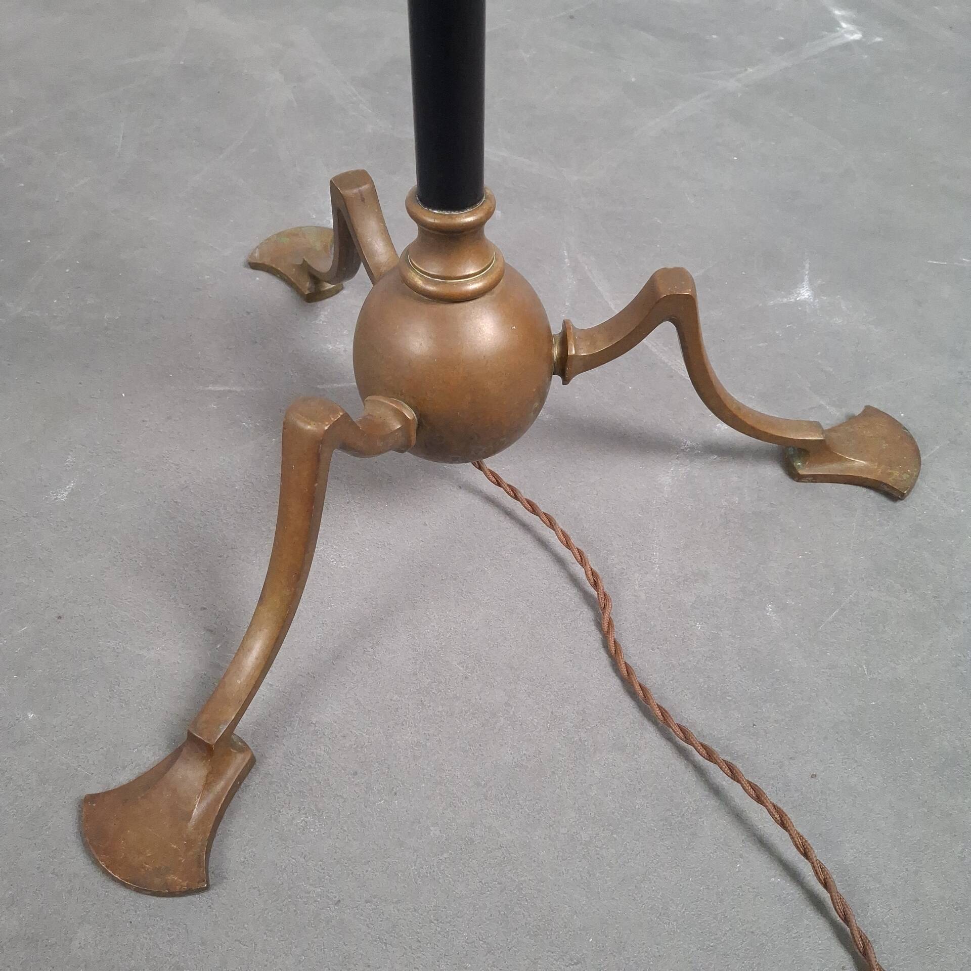 Art and Craft tripod floor lamp in bronze.