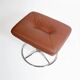 Vintage Scandinavian ottoman in brown leather with a chrome round base.