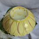 old strawberry drainer in slipware