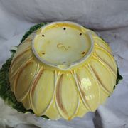 old strawberry drainer in slipware