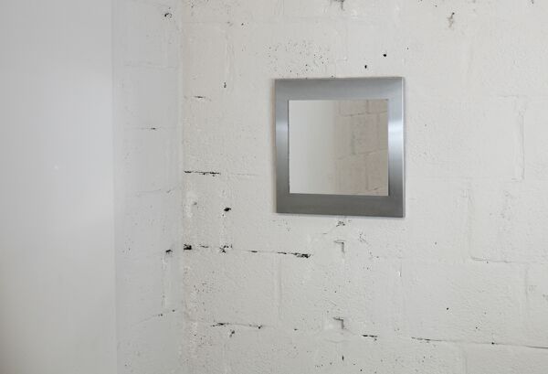 Miroir ''space age''. Acier inoxydable. France, circa 1970