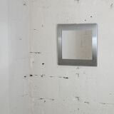 Miroir "space age". Acier inoxydable. France, circa 1970