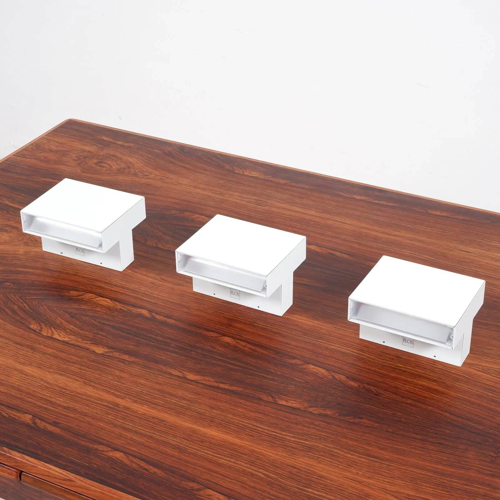 “Tight light” wall lamps by Piero Lissoni for Flos