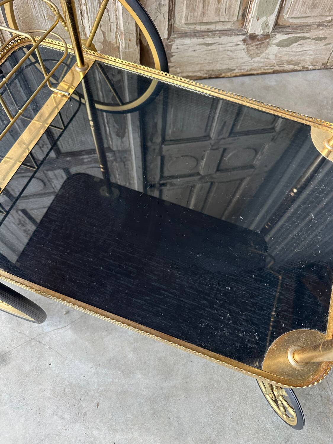 Vintage black and gold rolling trolley